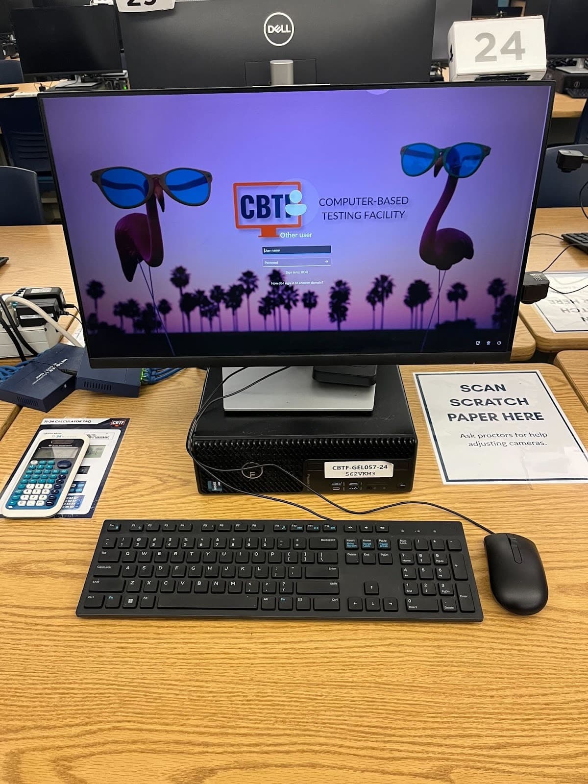 A CBTF workstation with a 'Scan Scratch Paper Here' placement guide to the right of the monitor